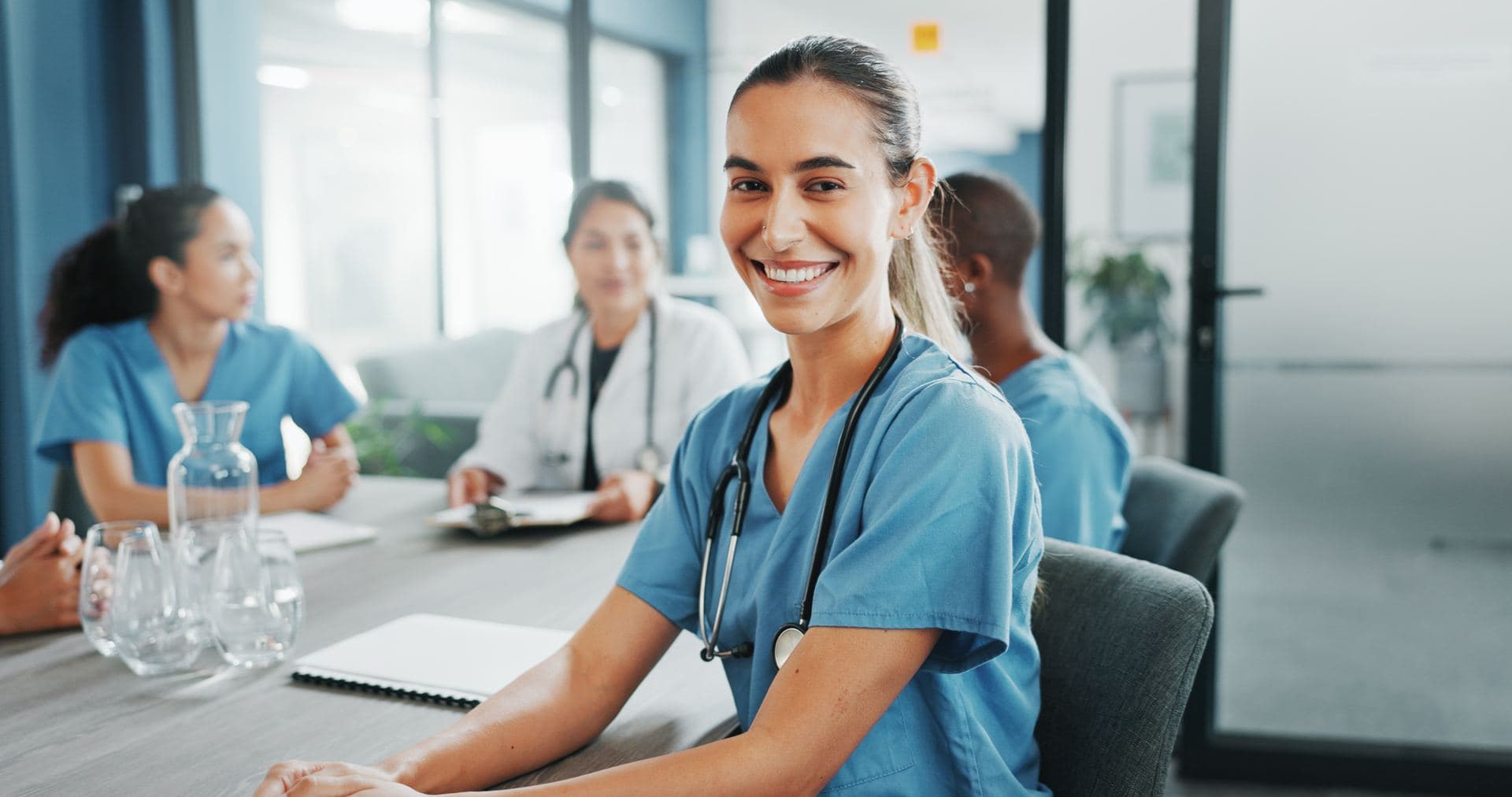 NE-BC – Nurse Executive – Board Certified Nurse leader in a hospital meeting preparing for NE-BC certification