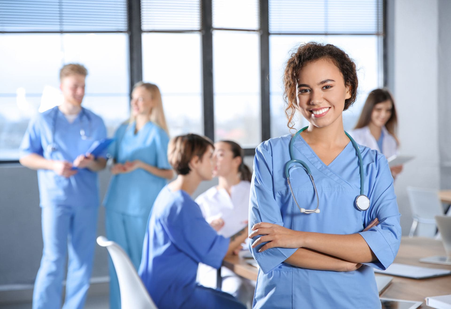 NI-BC – Nursing Informatics - Board Certified Informatics nursing students collaborating in a college classroom for NI-BC certification prep